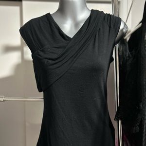 Black tank top by Fashion Nova